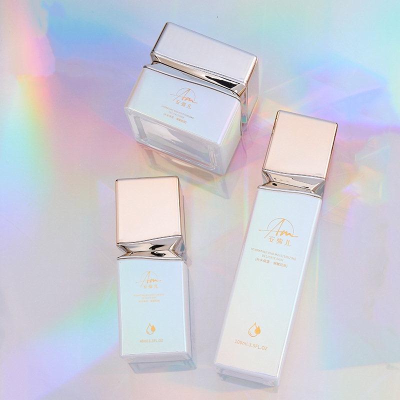 Firkantet glasskremkrukke med iriserende effekt for ansiktskrem og øyekrem Firkantet glasskremkrukke med iriserende effekt for ansiktskrem og øyekrem