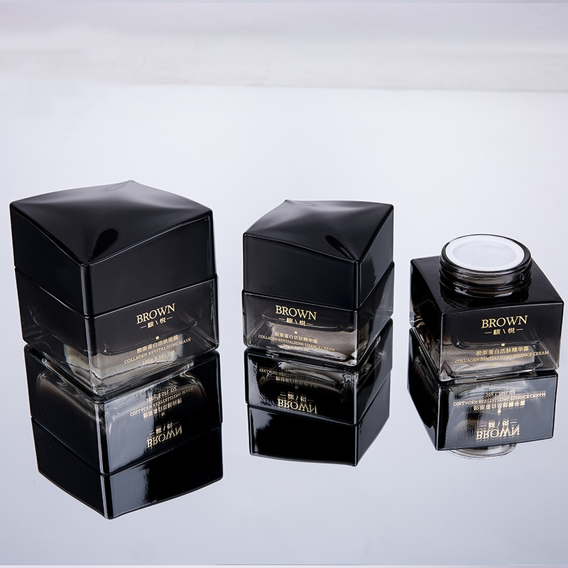 Unik firkantet glasskremkrukke med hevet lokkdesign for kosmetisk emballasje Unik firkantet glasskremkrukke med hevet lokkdesign for kosmetisk emballasje