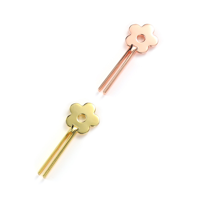 Smilende blomsterformet rørpresser i sinklegering Smilende blomsterformet rørpresser i sinklegering