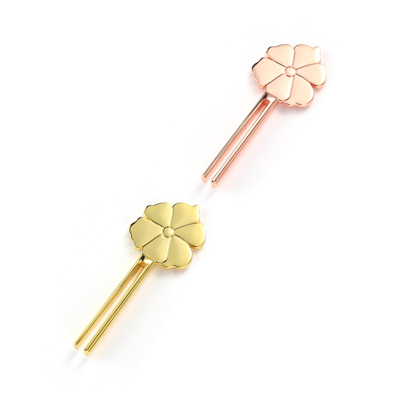 Smilende blomsterformet rørpresser i sinklegering Smilende blomsterformet rørpresser i sinklegering