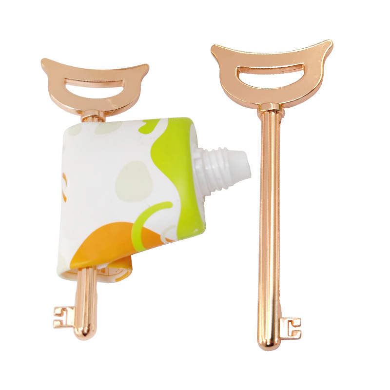 Unik design av den nøkkelformede sinklegeringsrørspresseren for tannkrem Kosmetikk kremfargepakke Unik design av den nøkkelformede sinklegeringsrørspresseren for tannkrem Kosmetikk kremfargepakke