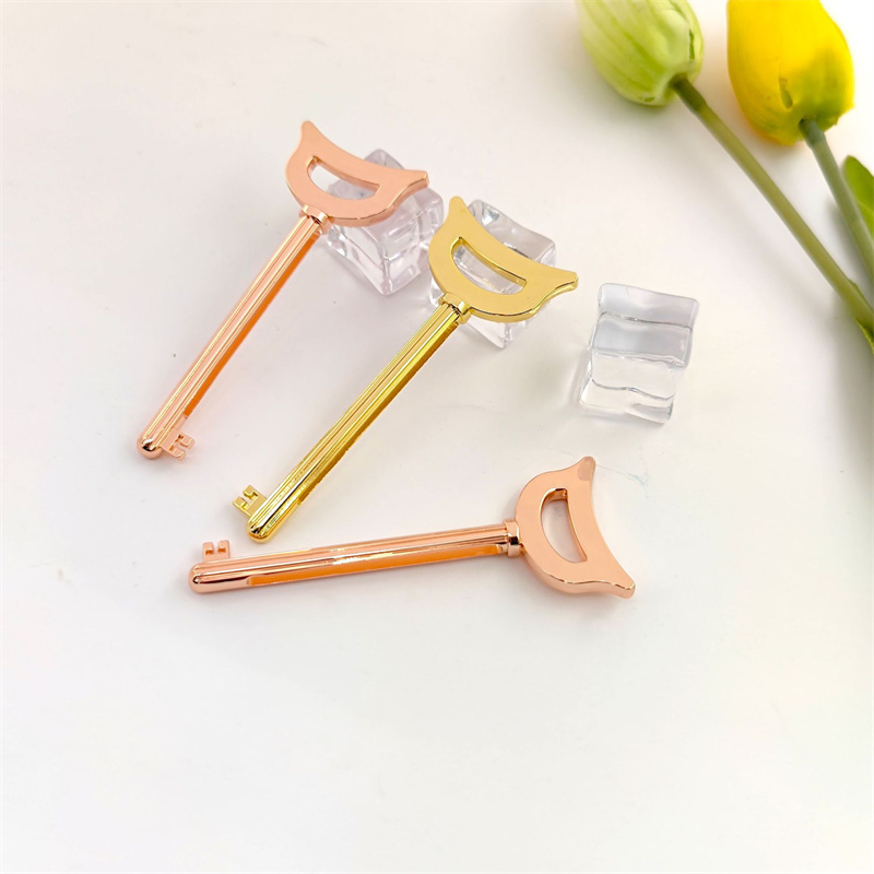 Unik design av den nøkkelformede sinklegeringsrørspresseren for tannkrem Kosmetikk kremfargepakke Unik design av den nøkkelformede sinklegeringsrørspresseren for tannkrem Kosmetikk kremfargepakke