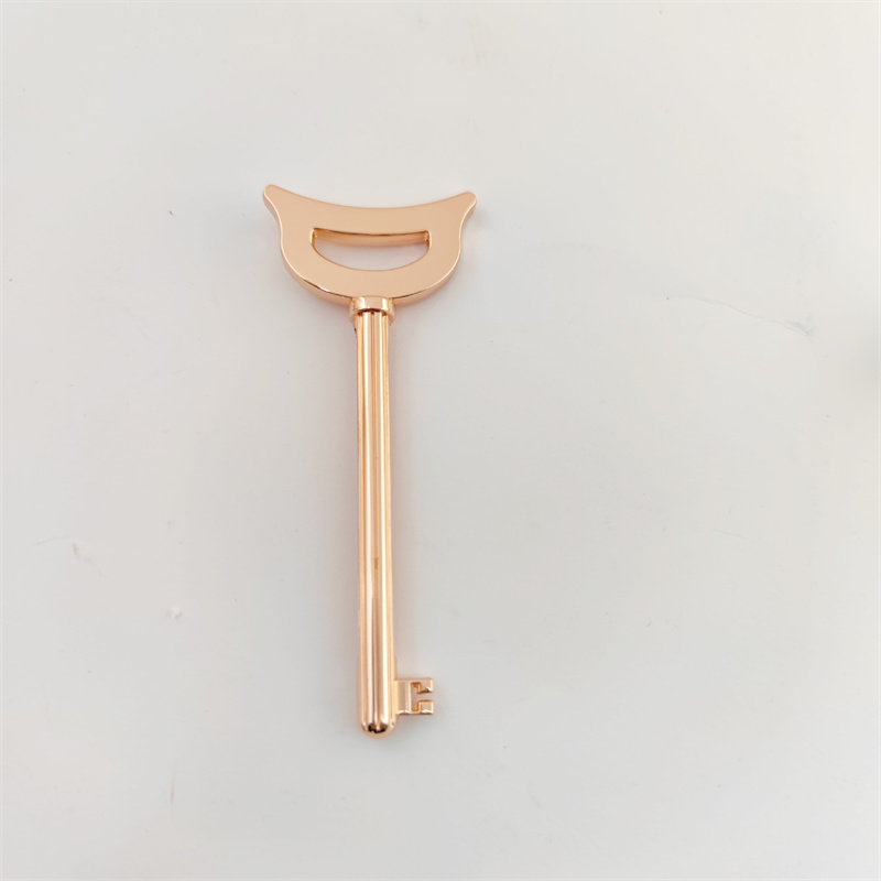 Unik design av den nøkkelformede sinklegeringsrørspresseren for tannkrem Kosmetikk kremfargepakke Unik design av den nøkkelformede sinklegeringsrørspresseren for tannkrem Kosmetikk kremfargepakke